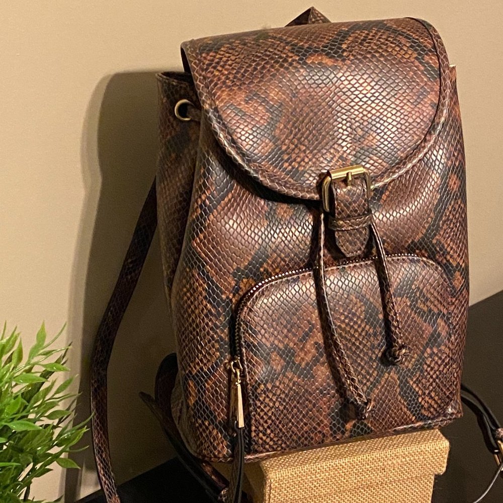 Aldo Black and Camel Animal Print Backpack